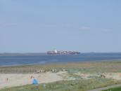 Belgien-Holland-Bootscharter Aermelkanal Belgien Westerschelde Strand mit Containerschiff